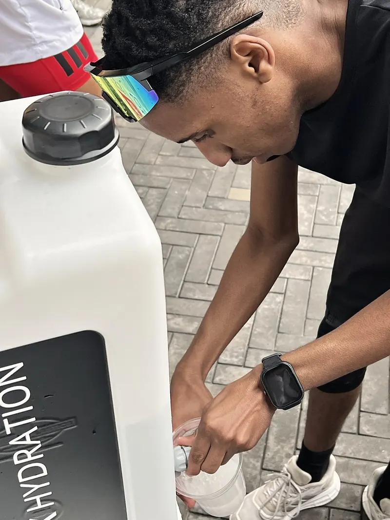 Filling up at the Peak Hydration station between sessions